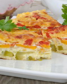 Кабачки жареные с яйцом и помидорами