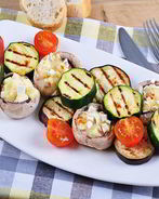Овощи-гриль с фаршированными шампиньонами