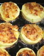 Запеченные фаршированные кабачки под сыром