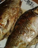 Карп запеченный с грибами в сметане