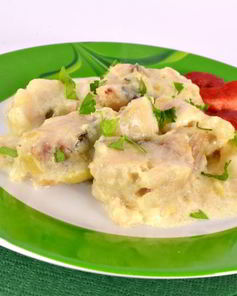 Хек тушеный в молоке