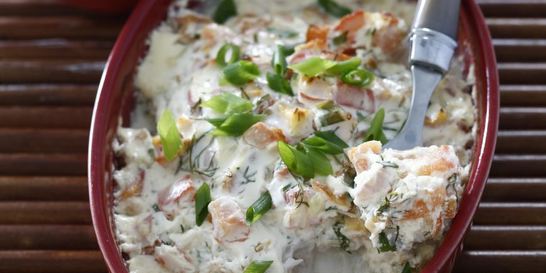 Рыба под соусом из сметаны, овощей и пармезана