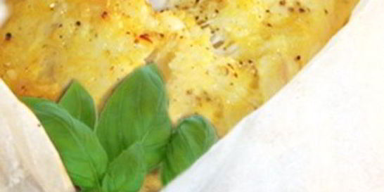 Треска с апельсиновым соусом и помидорами