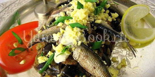 Шпроты на подушке из хлеба и баклажан