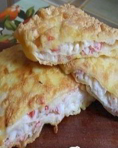 Закуска из тонкого лаваша и крабовых палочек