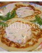 Оладьи кабачковые под сырным соусом