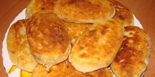 Пирожки с капустой и яйцом жареные