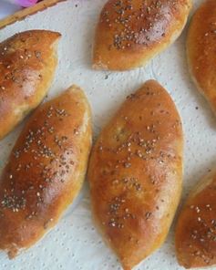 Цельнозерновые пирожки со снытью, морской капустой и яйцом