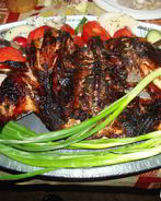 Курица, маринованная в белом вине на решетке