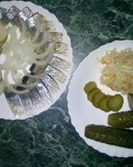 Вкусная закуска — сельдь с отварным картофелем